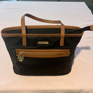 Black with tan leather Michael Kors bag